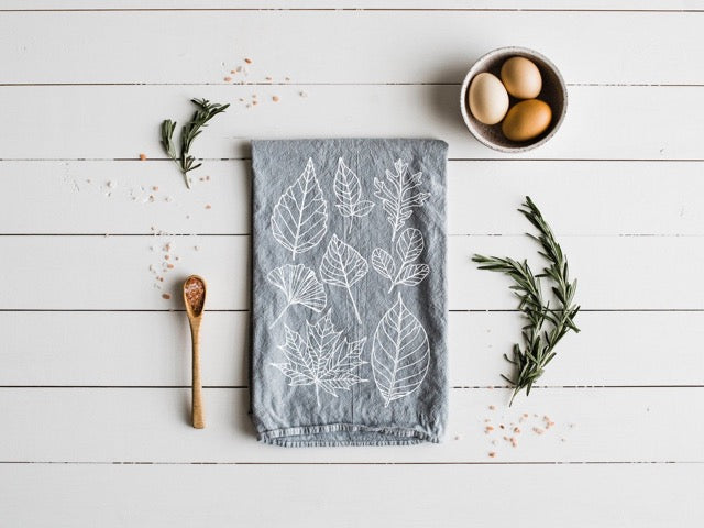 grey and white 100 percent organic cotton hand printed autumn leaves dishtowel for a farmhouse kitchen