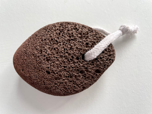 natural lava exfoliating pumice stone on a cotton rope