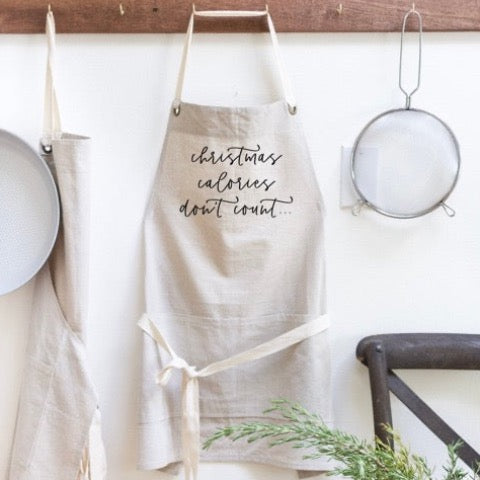 neutral linen Christmas Calories Don't Count scroll printed kitchen apron
