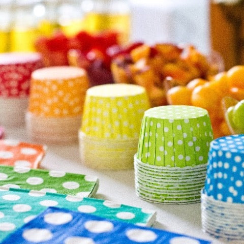 bright polka dot nut cups for a kids party to hold food and treats