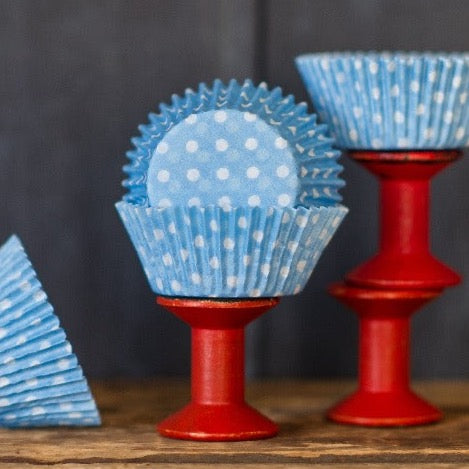 light blue and white polka dot paper cupcake liners for circus party supplies
