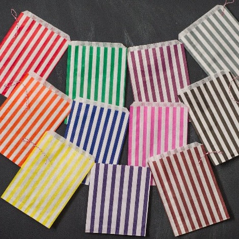 rainbow striped candy, treat, or gift bags for circus party