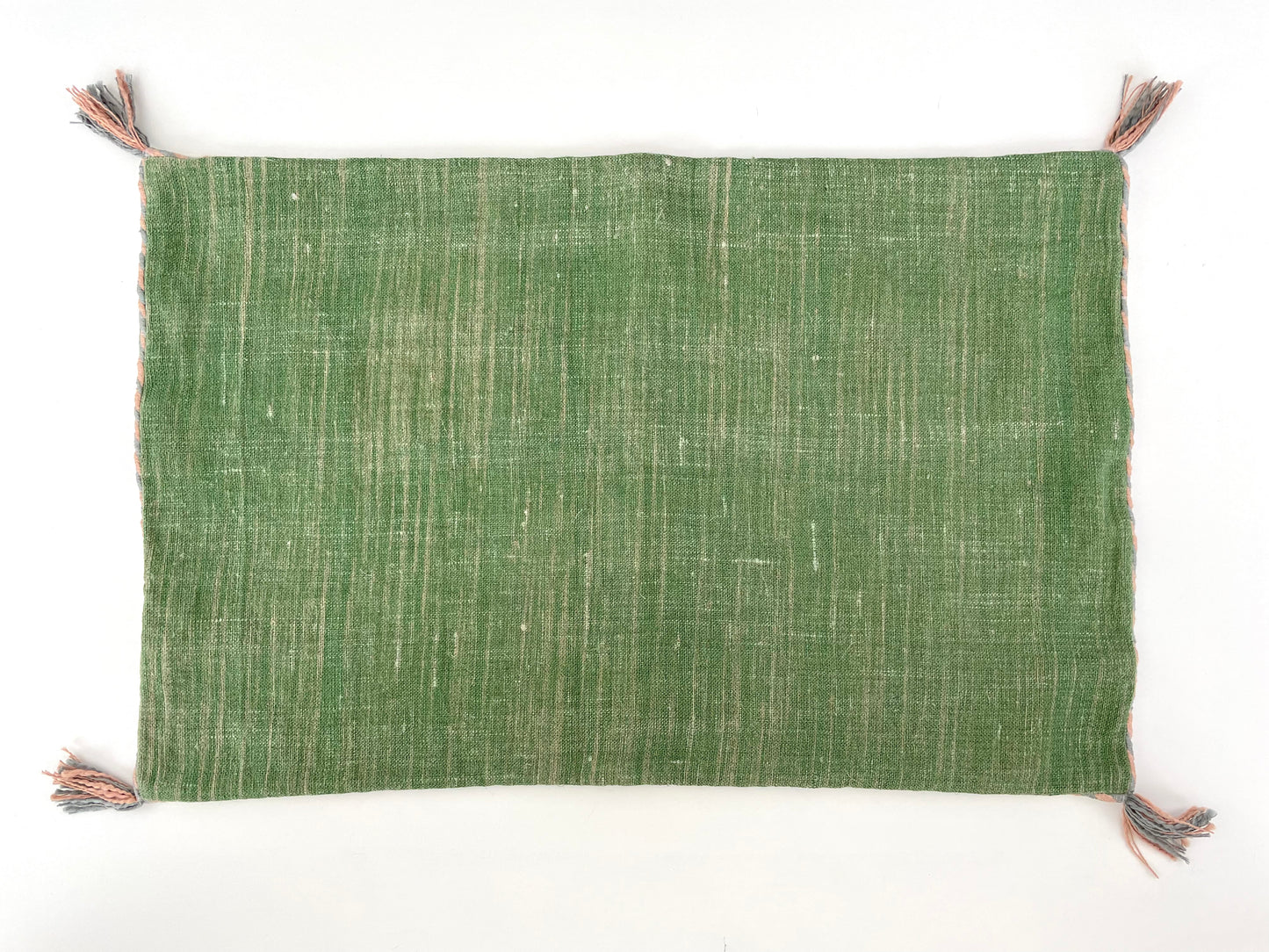 green linen 24x16 lumbar pillow cover with striped edging and tassels