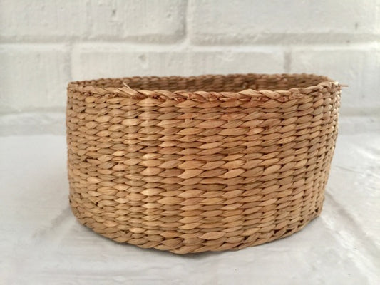 small woven natural round basket