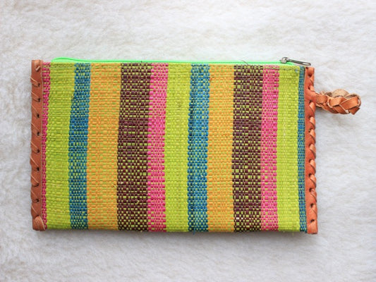 bright green, pink, blue, and yellow striped raffia woven zippered clutch with leather trim bohemian