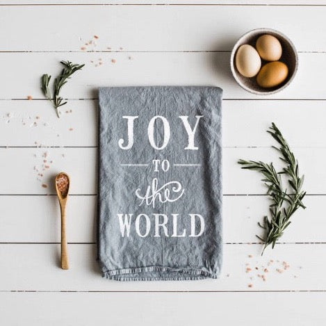 set of 2 white 100 percent organic cotton hand printed Christmas holiday dishtowels for a farmhouse kitchen with joy to the world printed on them in black ink
