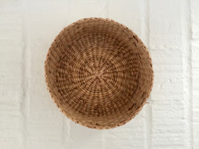 small woven natural round basket