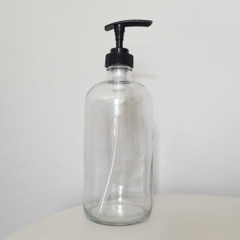 clear utilitarian bottle with black lotion pump in 8 ounce and 16 ounce sizes