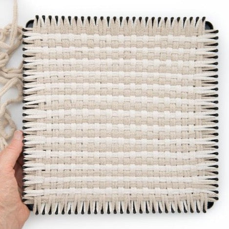 handmade 100 percent cotton gingham woven potholder or trivet on the loom