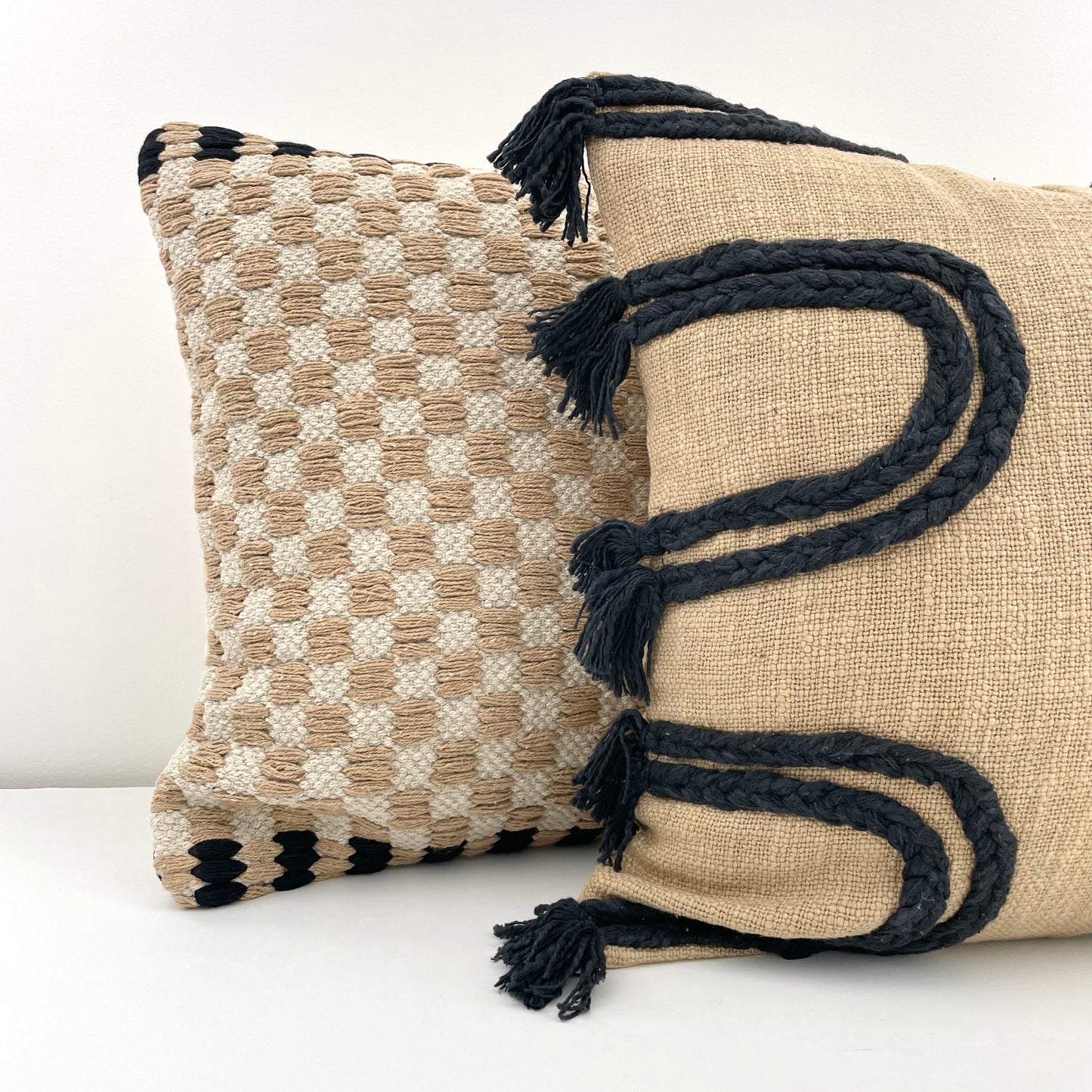 neutral tan and cream boho modern woven checkerboard and braided curves pillow covers