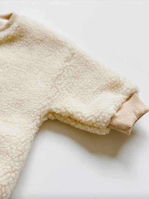 cream sherpa baby sweatshirt romper with ribbed collar and sleeves