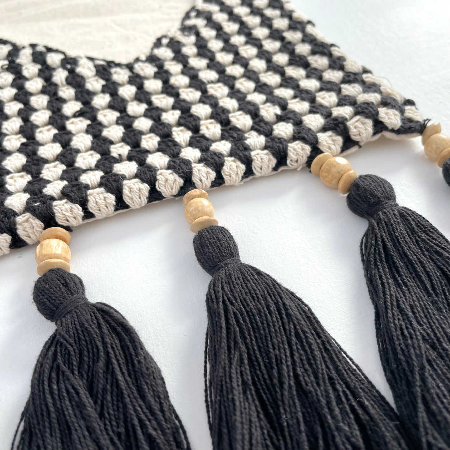 black and cream crochet boho wall pocket with fringe and beads