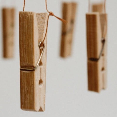 eco bamboo hanging laundry drying rack with clothespins