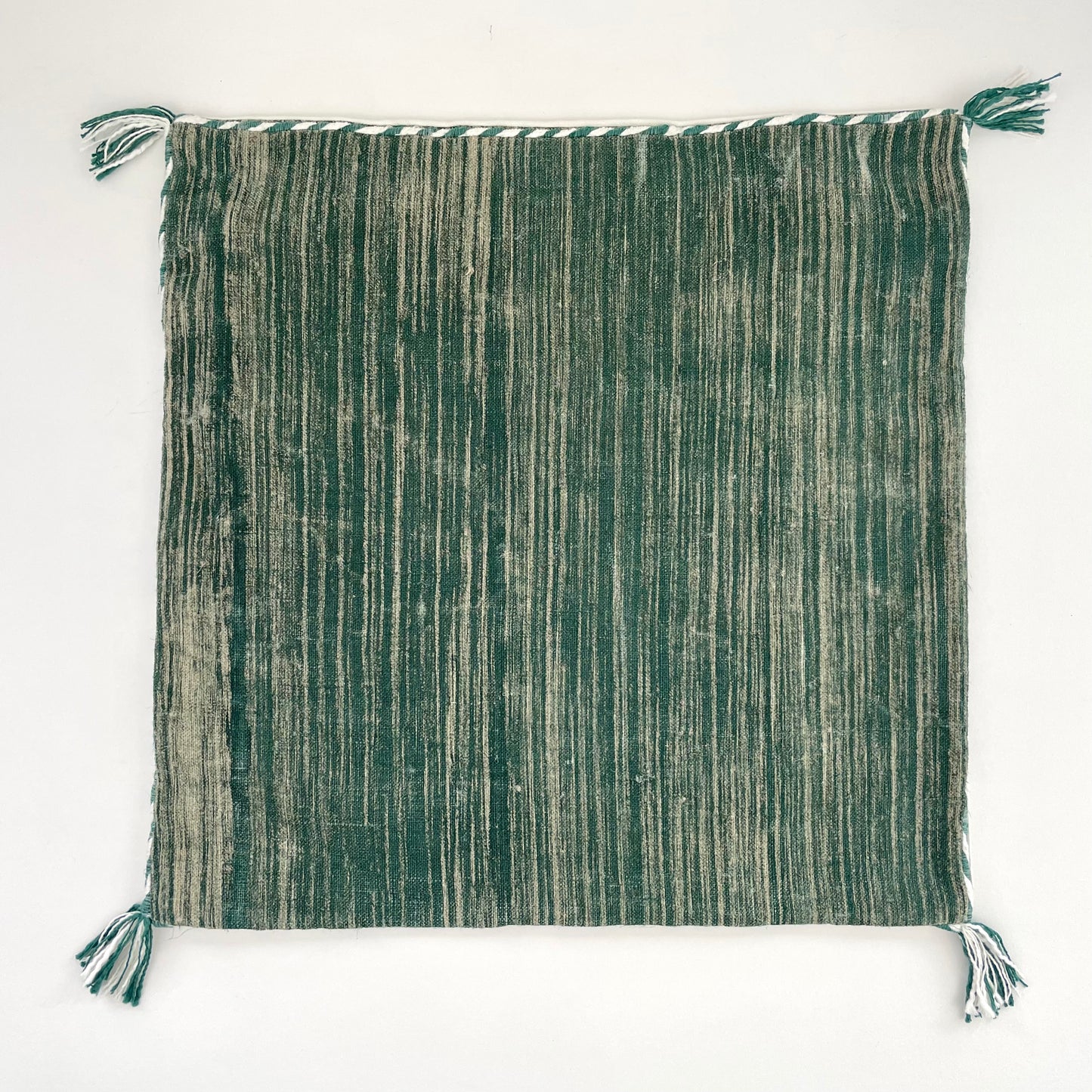 forest green linen 18x18 square pillow cover with striped edging and tassels
