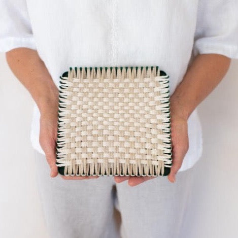 handmade 100 percent cotton woven potholder or trivet on the loom