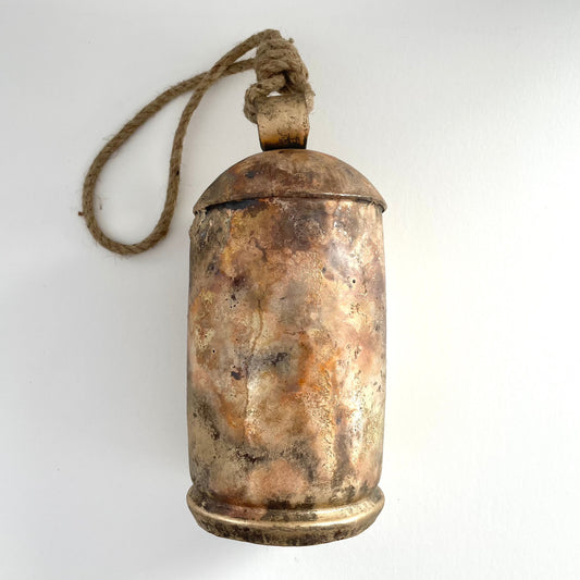 9 1/2" rustic tin bell with brass finish and wood striker