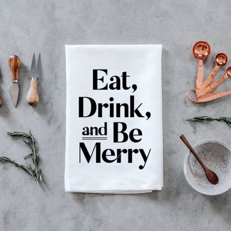 set of 2 white 100 percent cotton hand printed Christmas holiday dishtowels for a farmhouse kitchen with eat drink and be merry printed on them in black ink