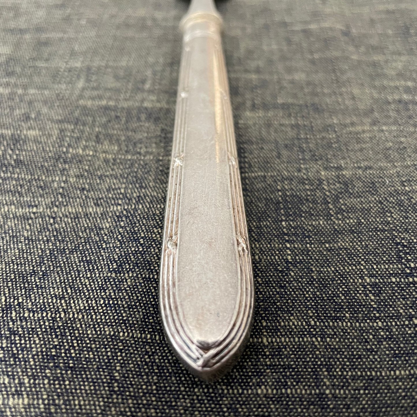 antique silver condiment server fork or prop photography