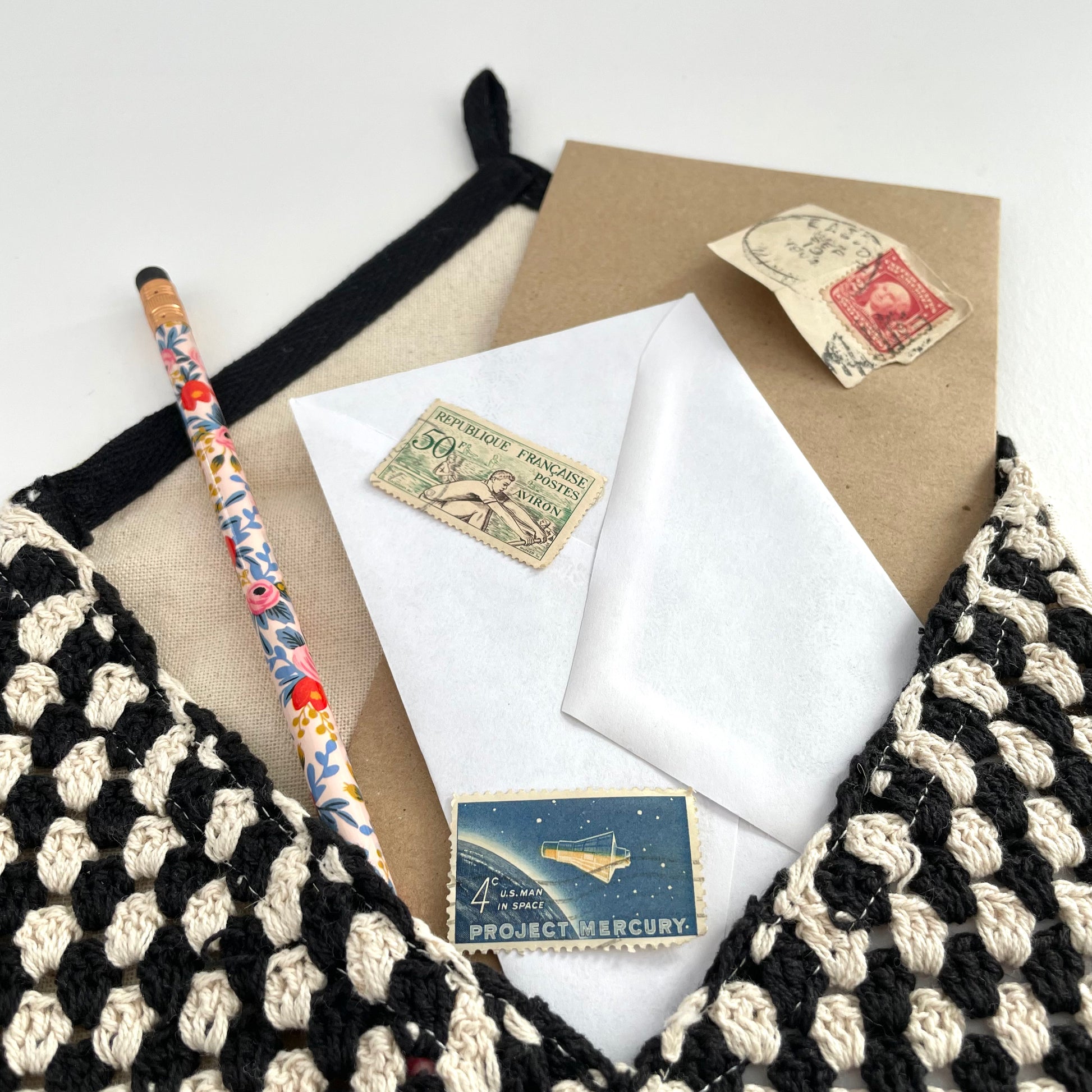black and cream crochet boho wall pocket with fringe and beads