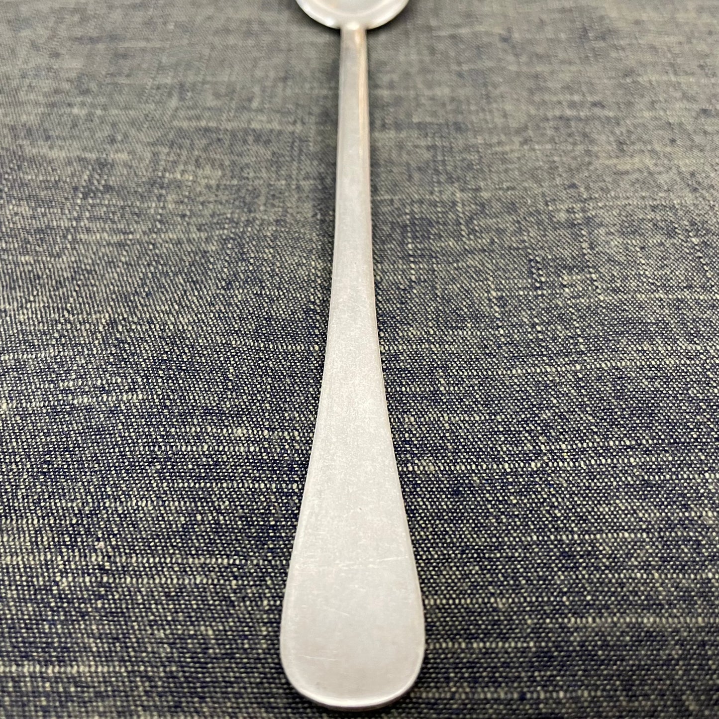 antique silver long handled teaspoon for serving jam or prop photography