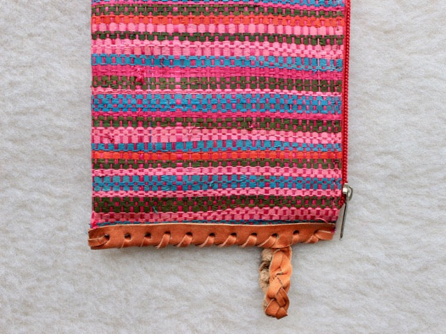 bright pink striped raffia woven zippered clutch with leather trim bohemian