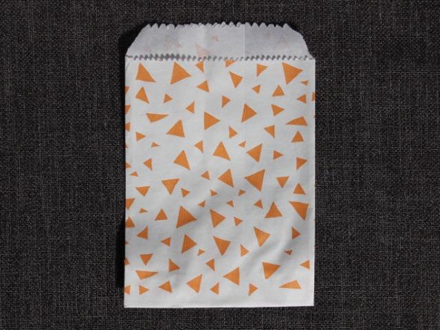 coral and white triangle printed modern mini paper candy, treat, or gift party bags