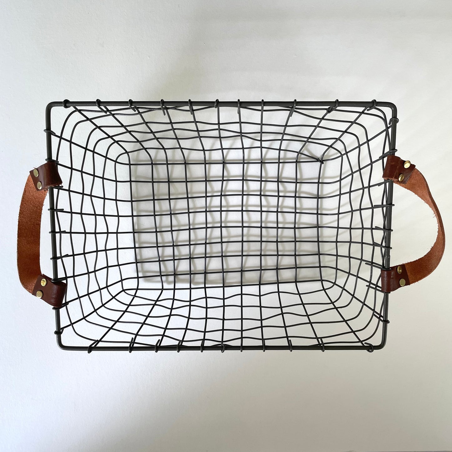 woven rectangular iron fruit basket with leather handles