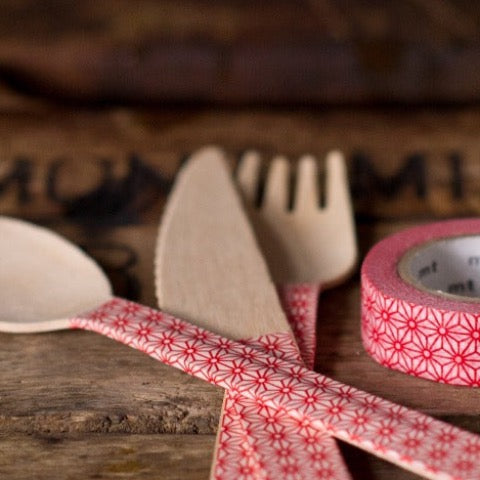 eco wooden cutlery with red floral Japanese washi tape decorating it