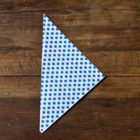 blue and white polka dot paper party cones to hold popcorn or treats