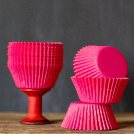 bright hot pink solid paper cupcake liners for circus party supplies