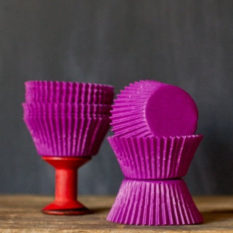 bright purple solid paper cupcake liners for circus party supplies