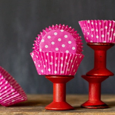bright hot pink polka dot paper cupcake liners for circus party supplies