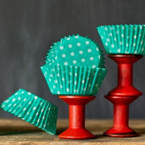 bright green polka dot paper cupcake liners for circus party supplies