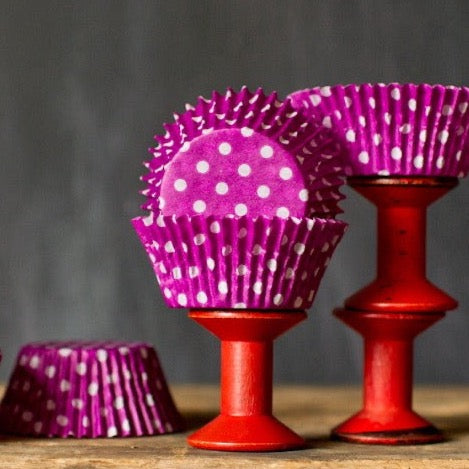 bright purple polka dot paper cupcake liners for circus party supplies