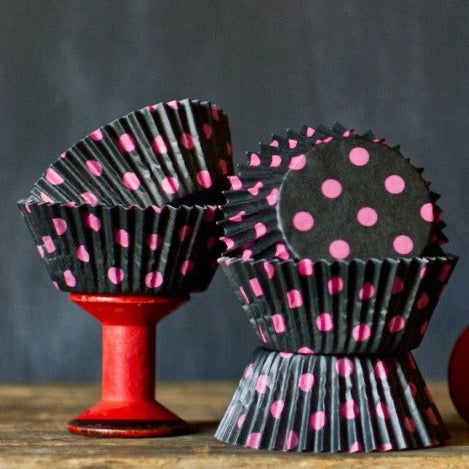 hot pink and black polka dot paper cupcake liners