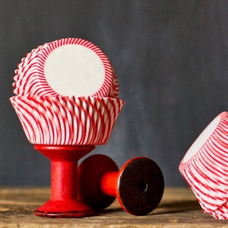 red and white striped paper cupcake liners for circus party supplies