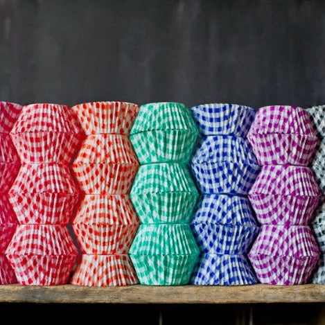 gingham paper cupcake liners in a rainbow of colors