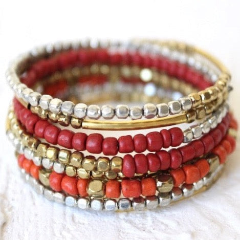 coral, red, silver, and gold metallic beaded coil bracelet