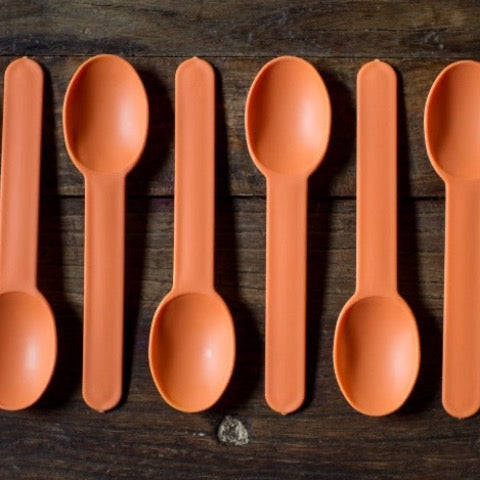 orange chunky plastic disposable full size party spoons