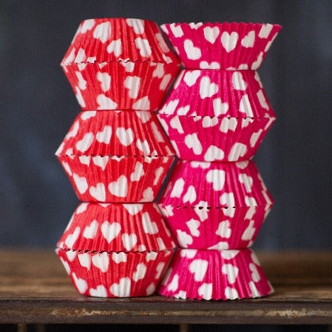 hot pink, red, and white heart printed paper cupcake liners for Valentines Day