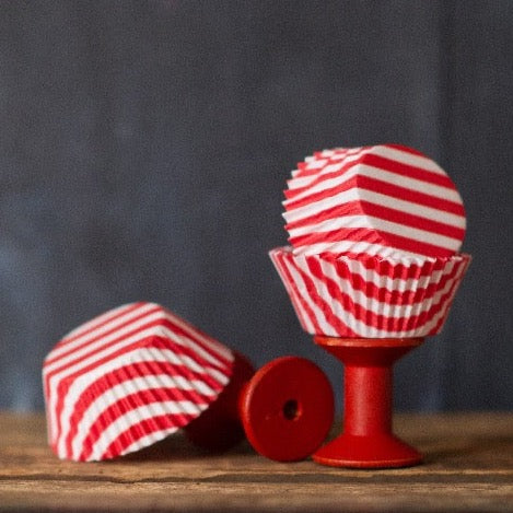red and white striped paper cupcake liners for circus party supplies