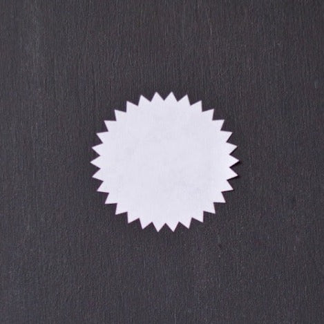 white round starburst sticker labels